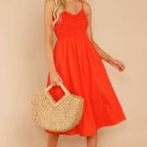 Red smocked midi dress